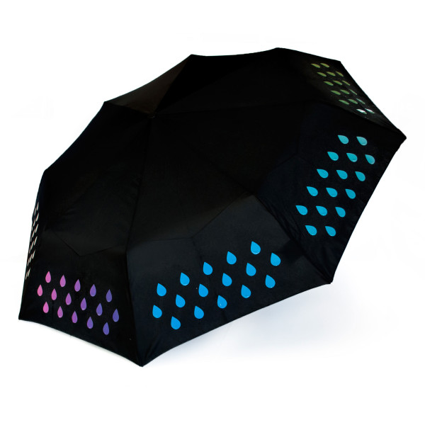 Regenschutz mit magischen Effekt: handlicher Taschenschirm der bei Kontakt mit Wasser die Farbe verändert. SUCK UK Regenschirm Colour Changing Tropfenprint - bunt (nass), weiß (trocken).